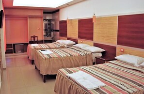Deluxe Triple Room, Terrace | In-room safe, desk, free WiFi
