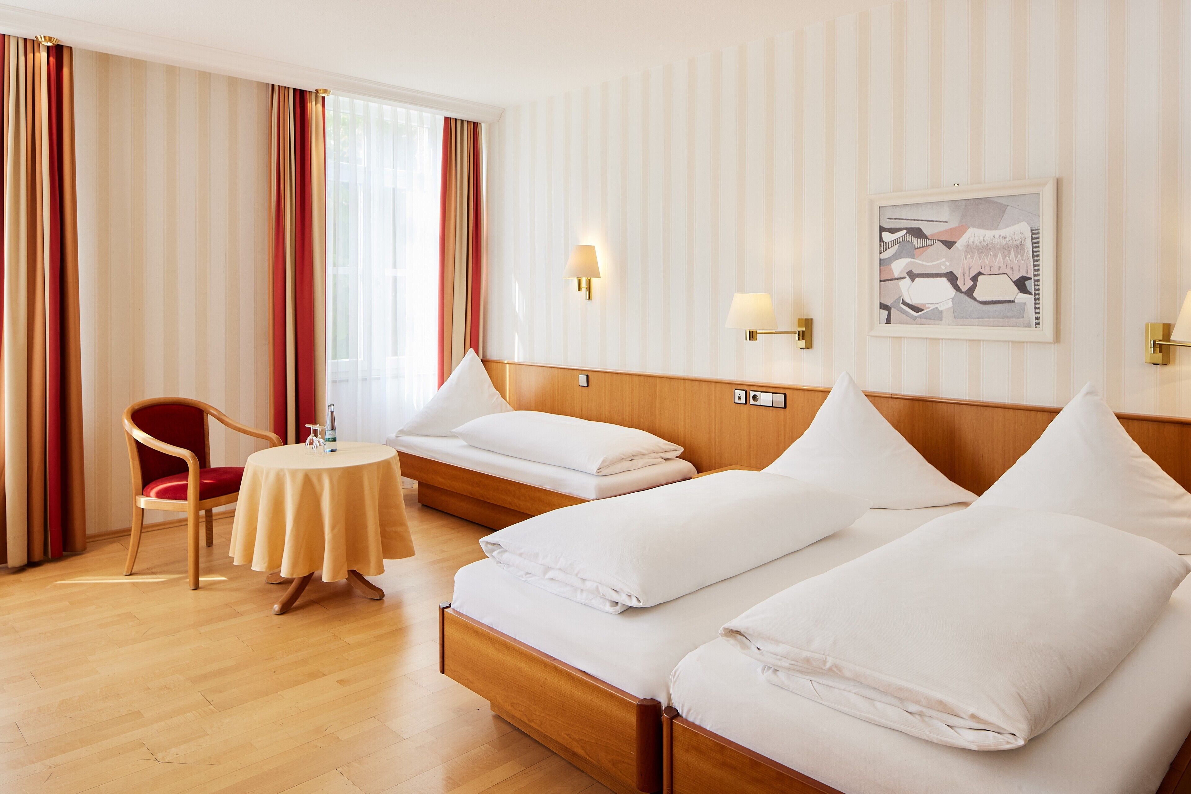 family room | 1 bedroom, minibar, in-room safe, desk