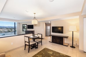 Studio, 1 Queen Bed | Living area | 55-inch flat-screen TV with cable channels, TV
