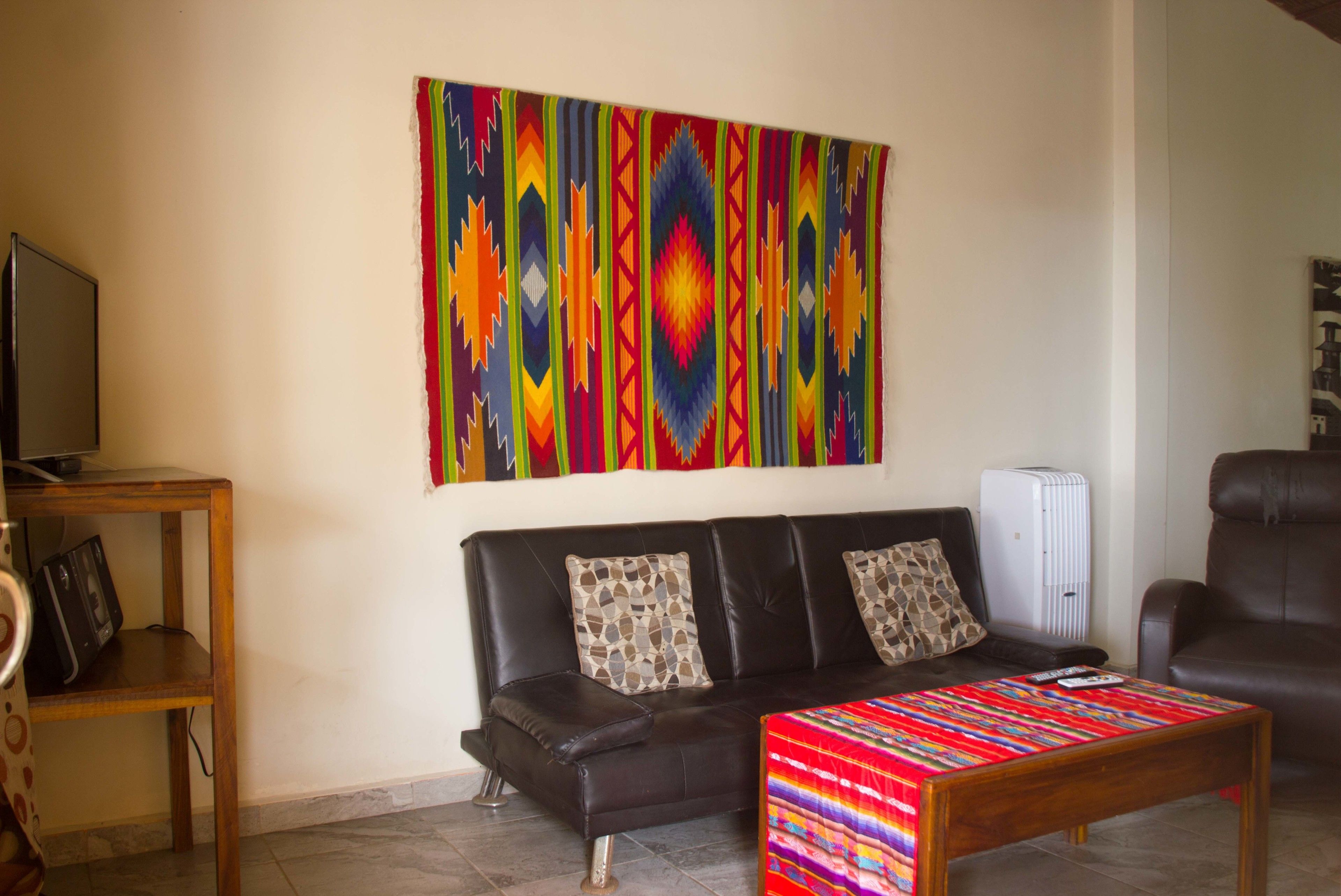 premier cottage, 2 bedrooms, kitchen, sea view | living room | 32-inch flat-screen tv with cable channels, tv, netflix