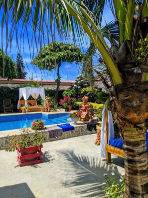 Outdoor pool, sun loungers - The Cottages by the sea (Charapoto)