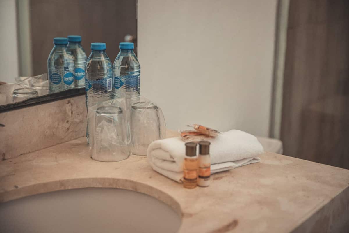 shower, rainfall showerhead, towels, soap