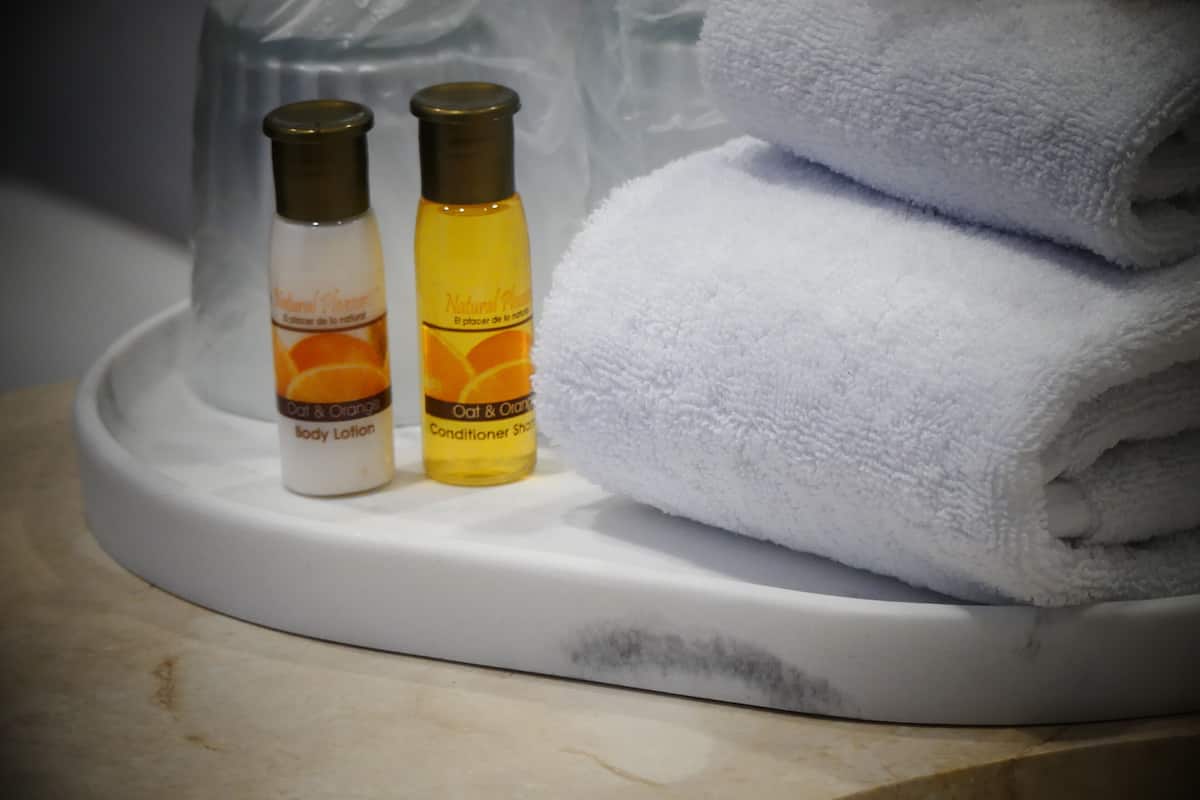 luxury suite, private pool | bathroom | shower, rainfall showerhead, towels, soap