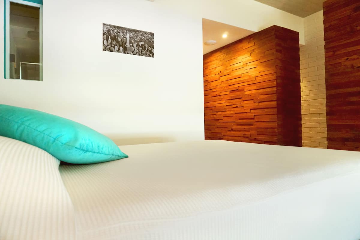 Suite Deluxe | Literie de qualité supérieure, fer et planche à repasser, Wi-Fi gratuit