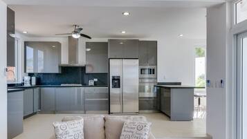 Full-size fridge, microwave, stovetop, coffee/tea maker