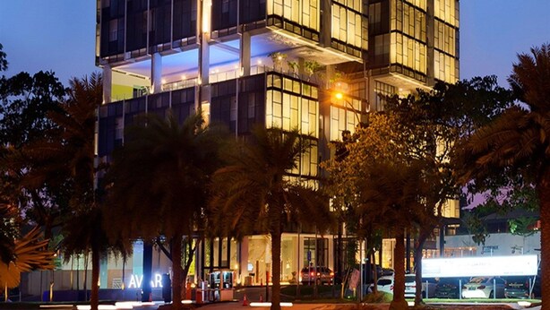 A modern multi-story building with the name "AVIARY" prominently displayed. - Aviary Bintaro (South Tangerang)
