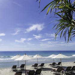 On the beach, beach umbrellas, beach towels, beach massages