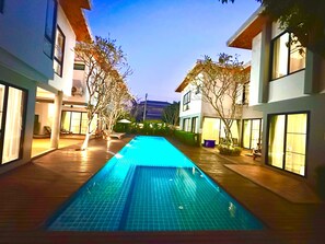 Outdoor pool, pool umbrellas, sun loungers