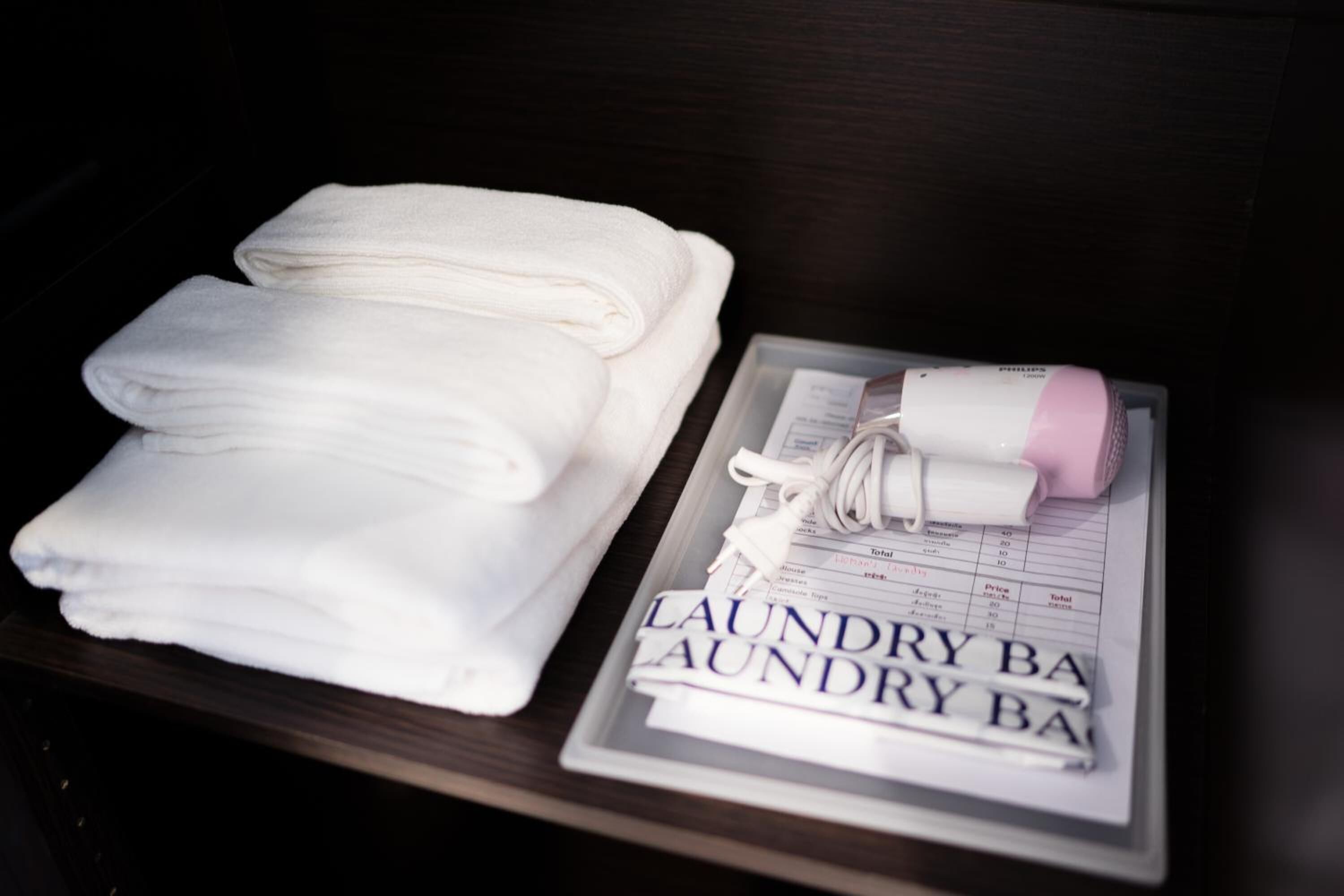 shower, free toiletries, hair dryer, towels