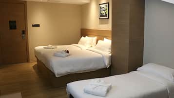 Ropa de cama de alta calidad y minibar