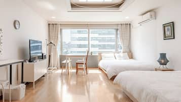 32-inch flat-screen TV with cable channels, TV, pay movies