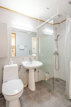 Shower, free toiletries, hair dryer, slippers