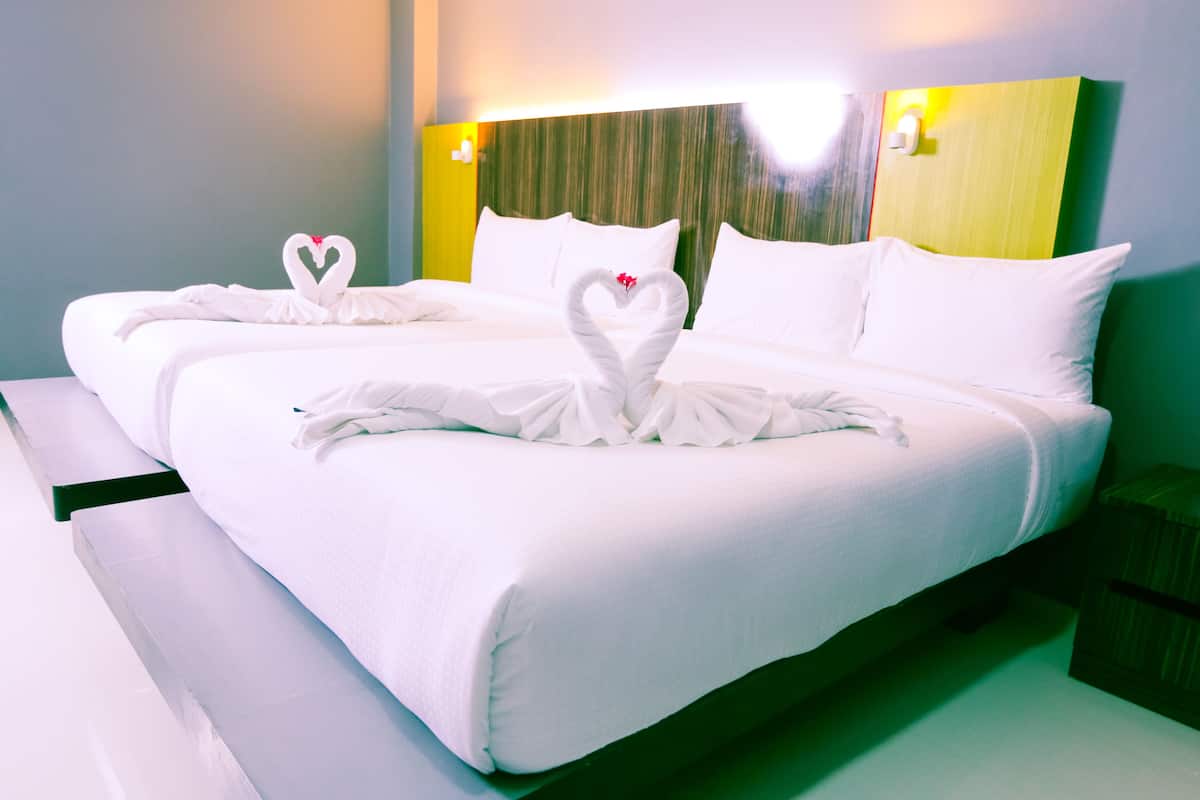 Mountain View Twin Bed for 4 People | Premium bedding, minibar, individually furnished, desk