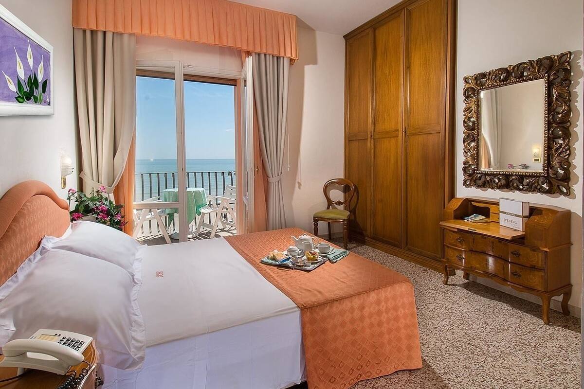 Basic Double or Twin Room, Partial Sea View | In-room safe, desk, WiFi (free), bed sheets