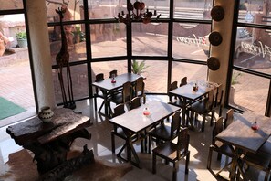 Breakfast, lunch, dinner served; local and international cuisine 