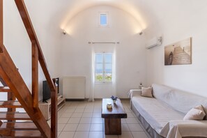 Superior Apartment, 3 Bedrooms, Patio, Sea View | Living area - Ampelos Executive Houses (Santorini)