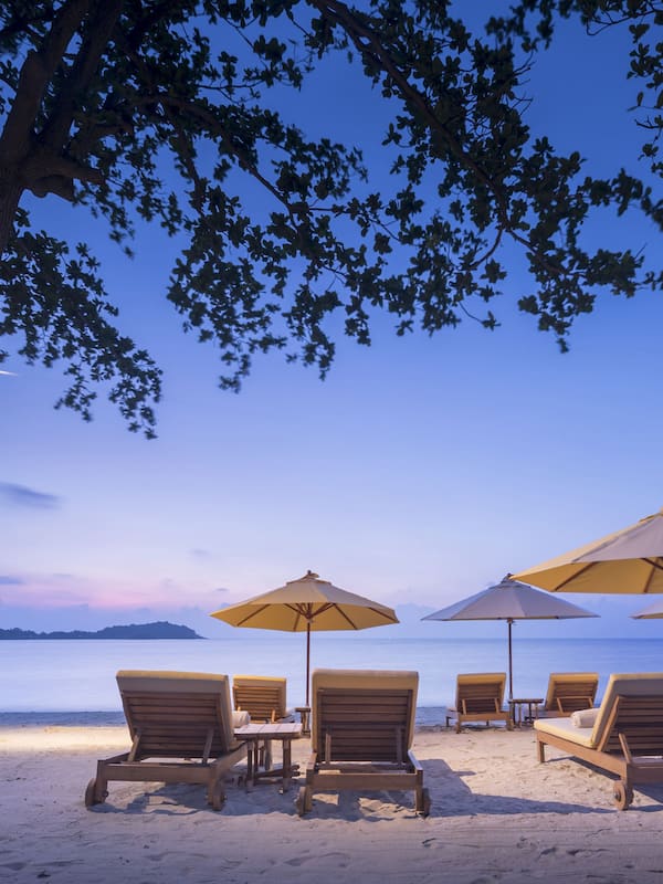 On the beach, sun loungers, beach umbrellas, beach towels
