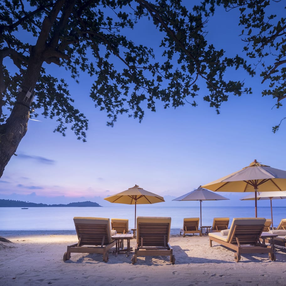 On the beach, sun loungers, beach umbrellas, beach towels