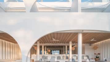 Un intérieur moderne avec un espace salon central, de grandes fenêtres et un plafond au design original.