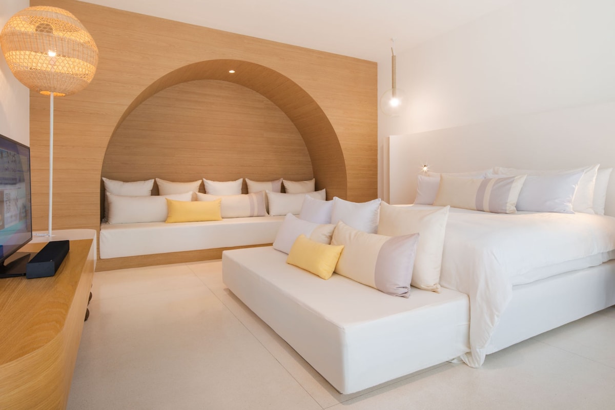 Ropa de cama de alta calidad y minibar 