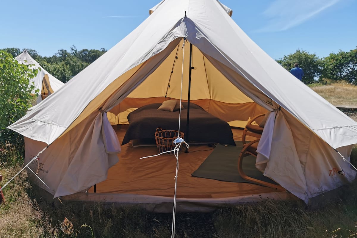 Comfort Tent | Blackout drapes, free WiFi, bed sheets