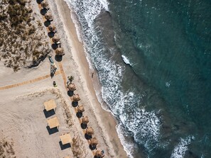 On the beach, white sand