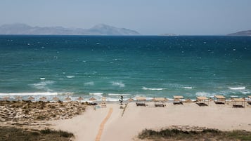 On the beach, white sand
