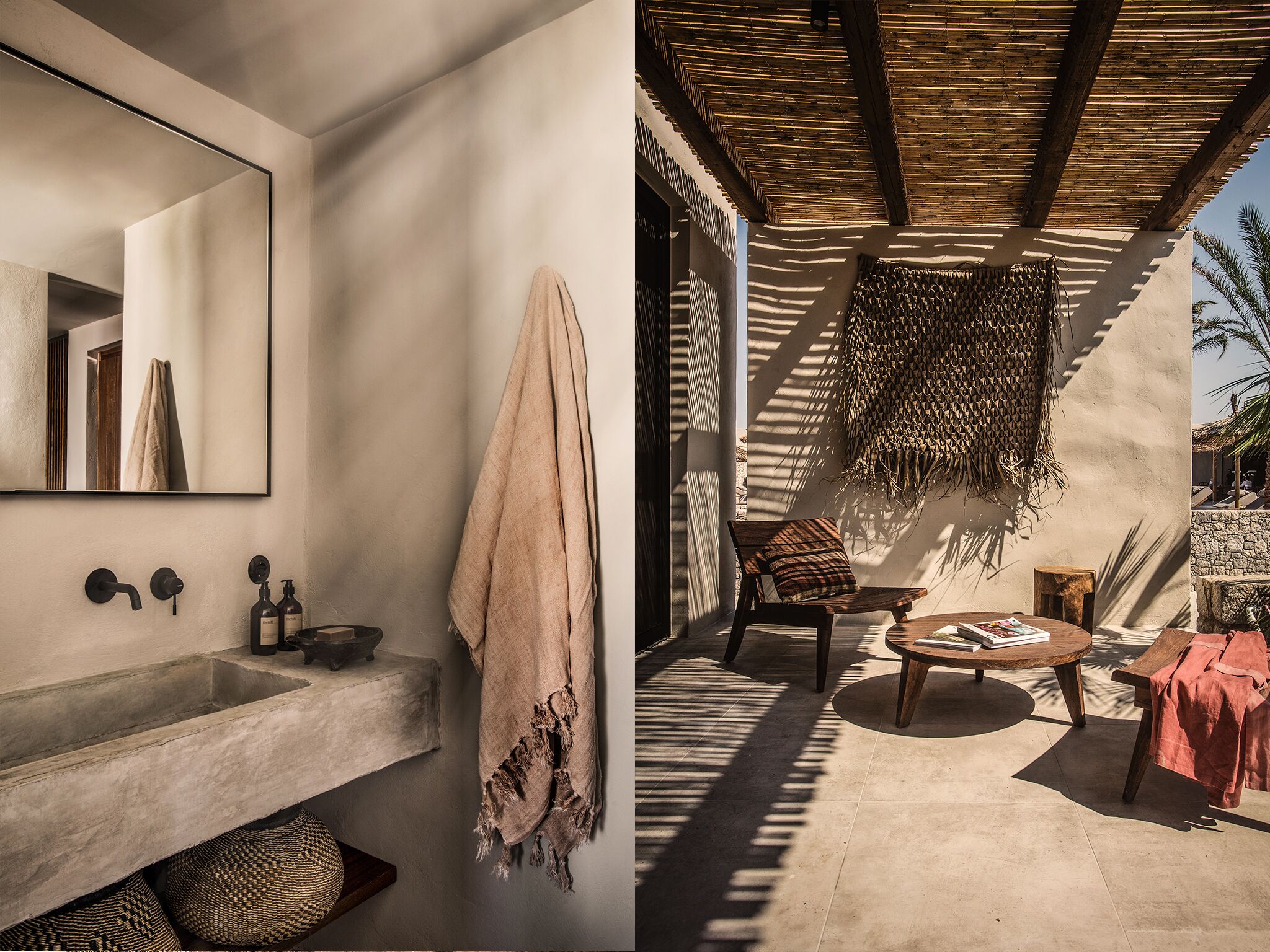 A bathroom with a large mirror, a towel hanging, and a sink with a basin.