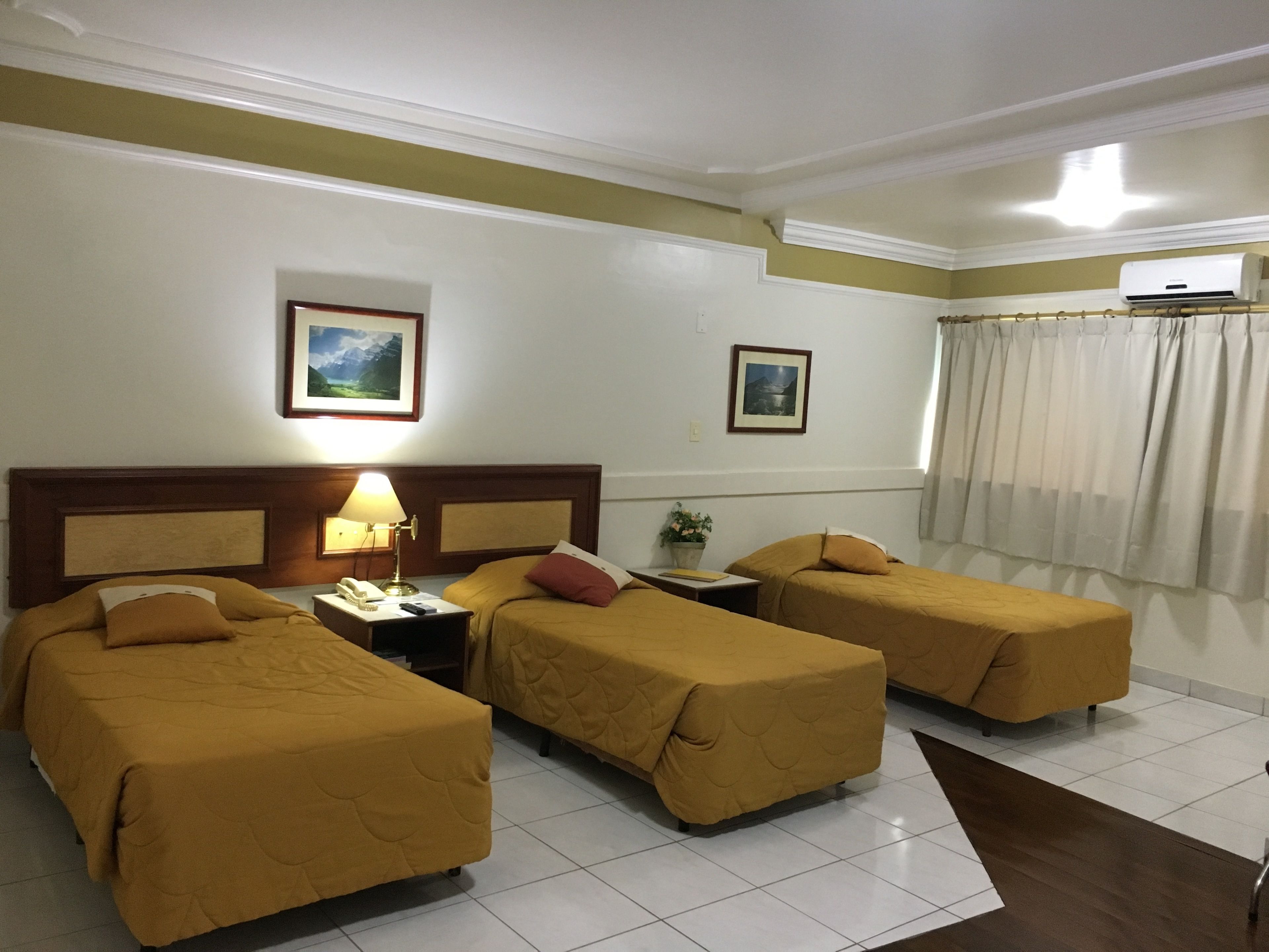 standard triple room, 1 bedroom | minibar, in-room safe, desk, blackout curtains