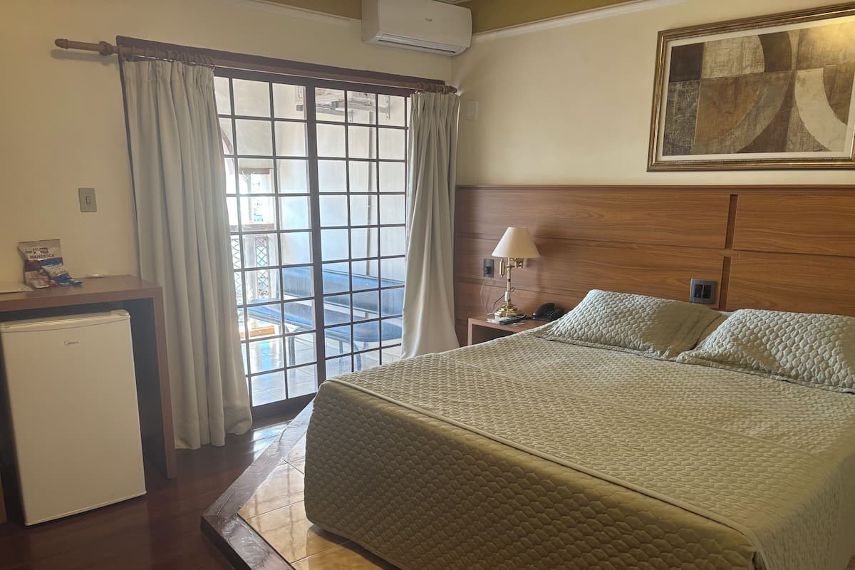 Standard Double Room, 1 Bedroom | Minibar, in-room safe, desk, blackout drapes
