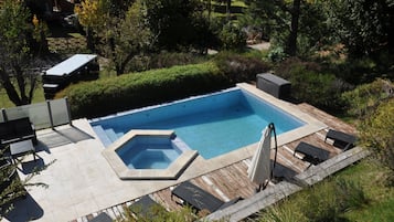Seasonal outdoor pool, open 10:00 AM to 9:00 PM, sun loungers