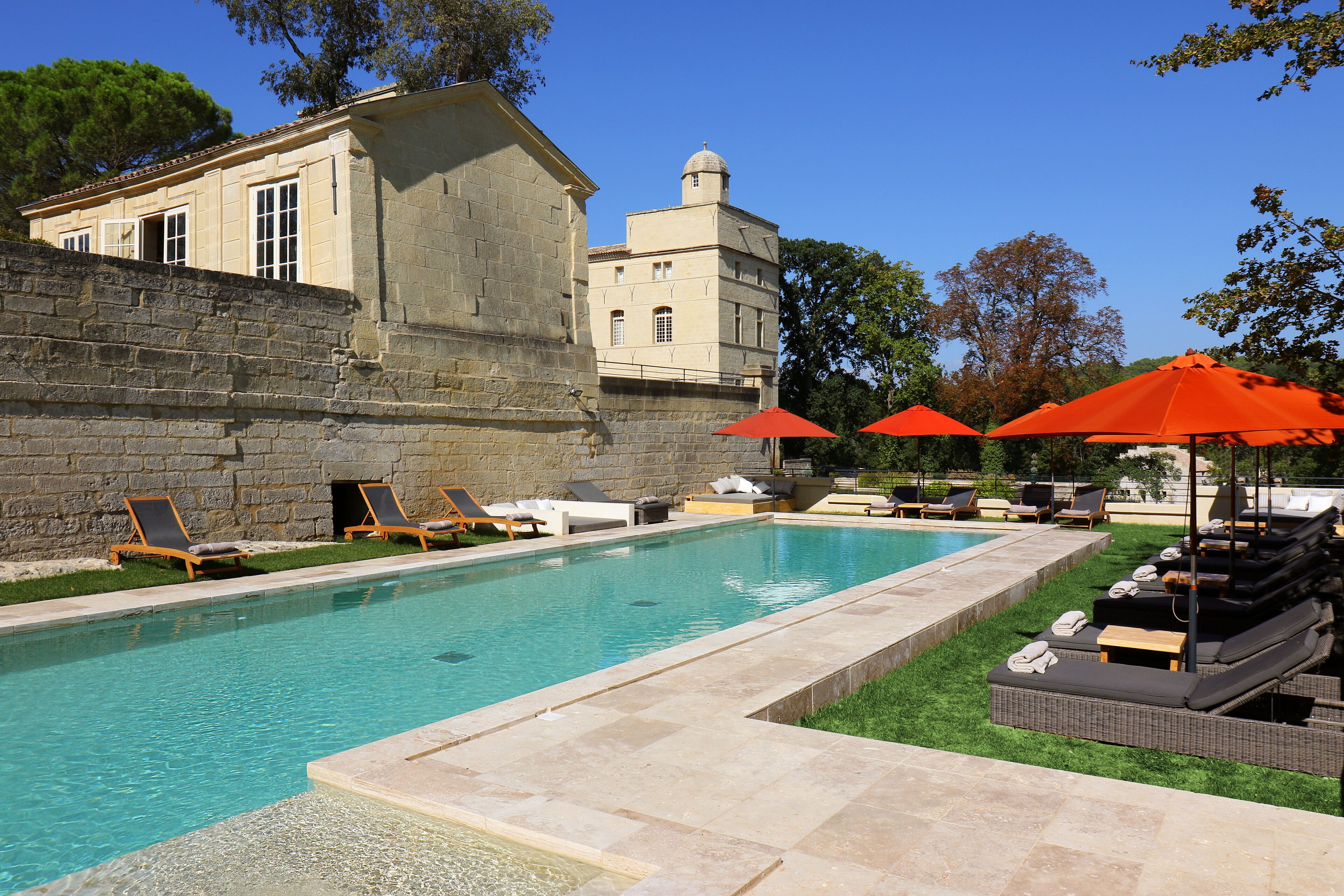 Seasonal outdoor pool, open 9:30 AM to 8 PM, pool umbrellas