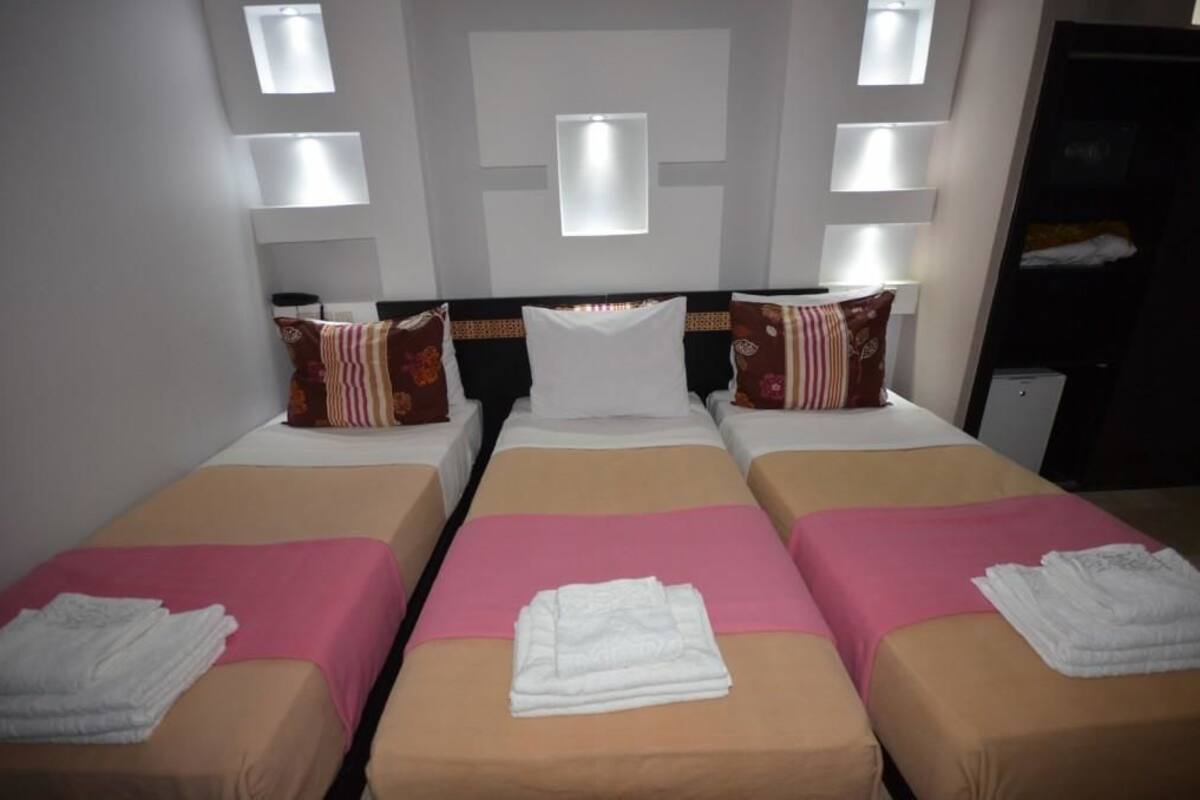Quarto triplo | Frigobar, cofres nos quartos, quartos à prova de som, Wi-Fi de cortesia