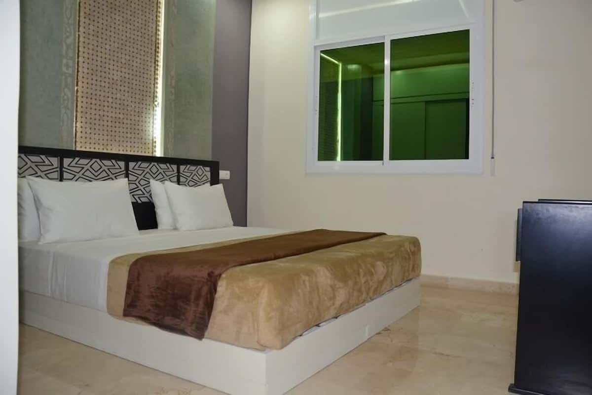 Apartamento | Frigobar, cofres nos quartos, quartos à prova de som, Wi-Fi de cortesia
