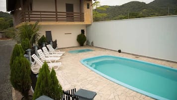 Outdoor pool, open 10:00 AM to 10:00 PM, sun loungers
