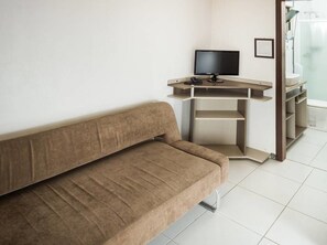 Flat-screen TV, table football, ping pong, books
