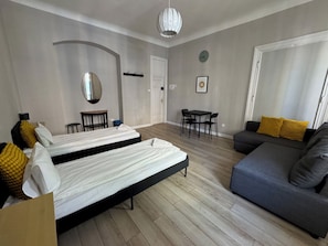 Family Triple Room, Multiple Beds | In-room safe, iron/ironing board, free WiFi - Chillout Hostel (Warsaw)
