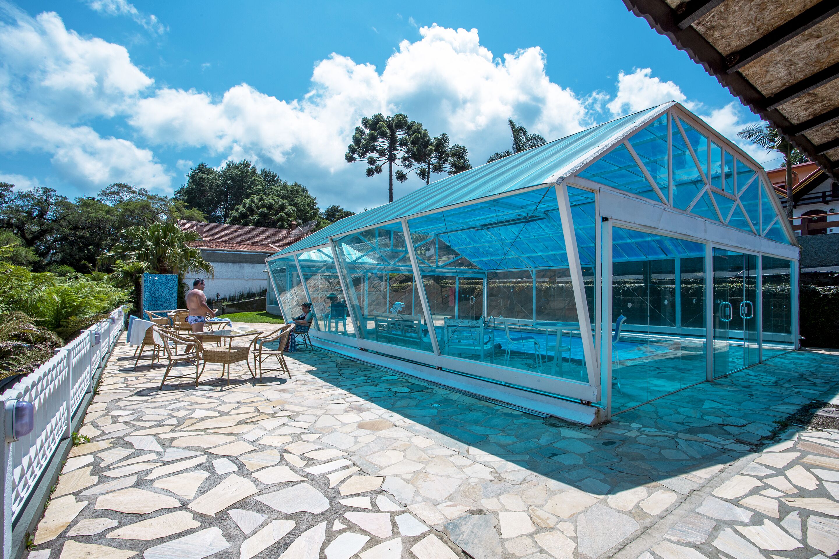 indoor pool, open 9:00 am to 6:00 pm, pool umbrellas, pool loungers