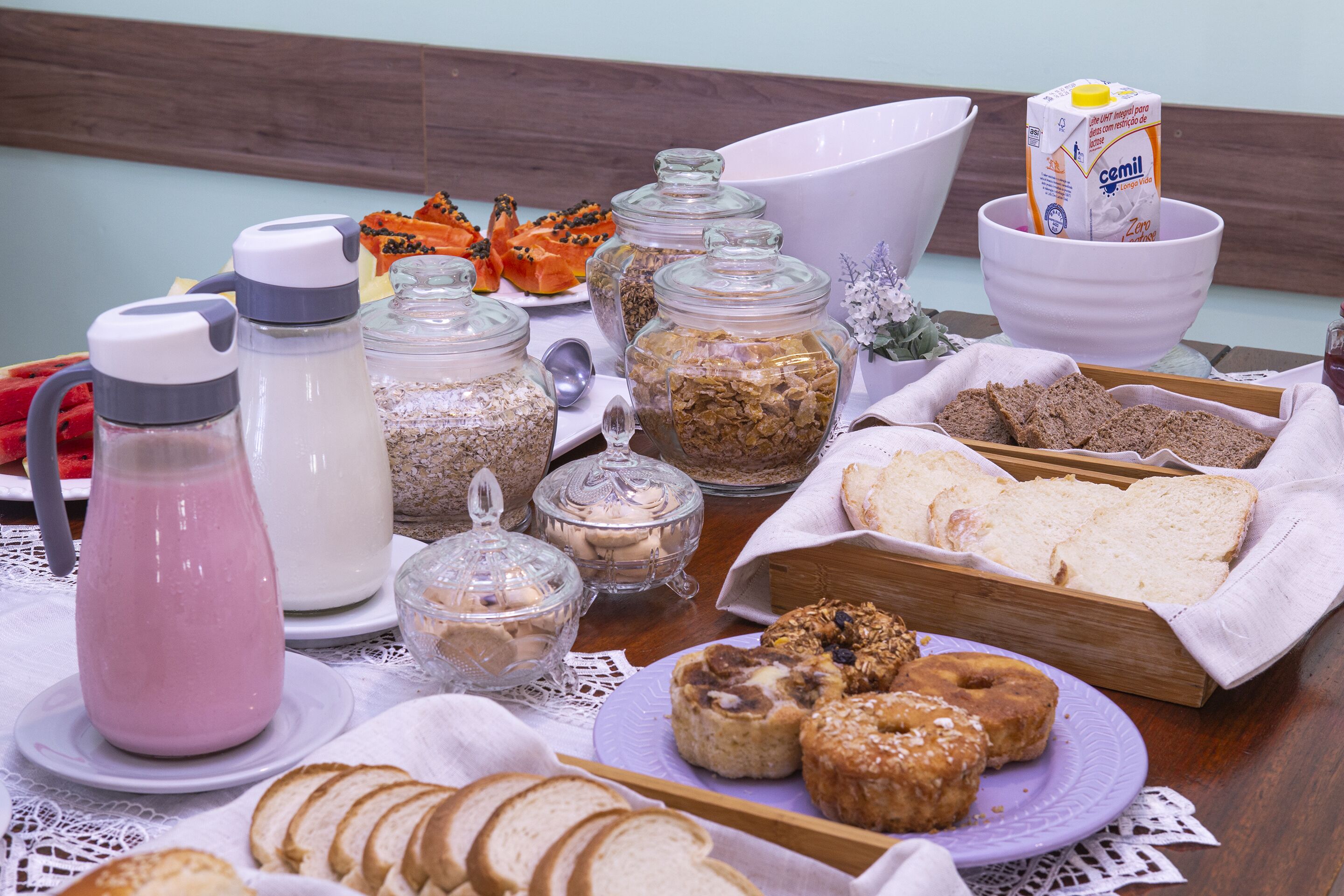 A breakfast buffet with various food items and beverages.