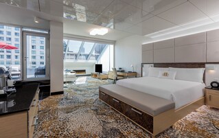 Premium bedding, memory-foam beds, minibar, in-room safe