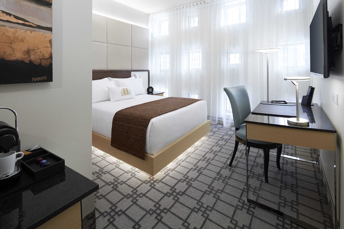 Premium bedding, memory foam beds, minibar, in-room safe