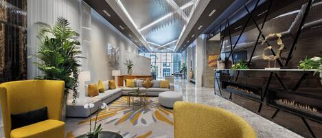 A modern lobby with a sofa set, yellow armchairs, a coffee table, and a piano.