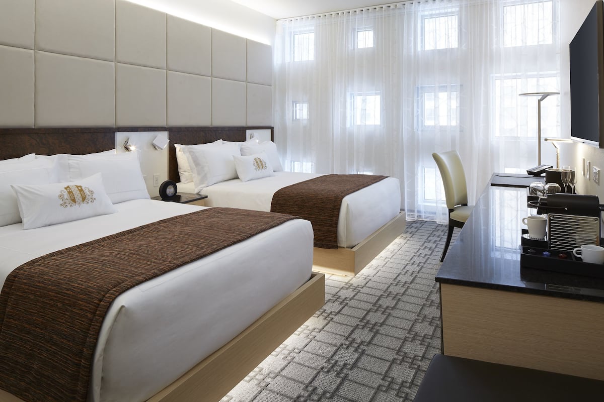 Premium bedding, memory foam beds, minibar, in-room safe