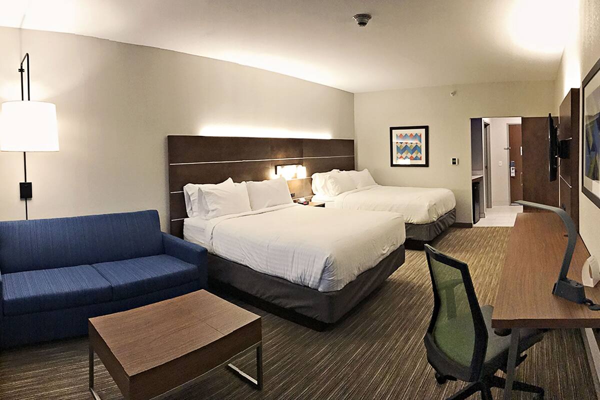 suite | in-room safe, desk, blackout curtains, iron/ironing board