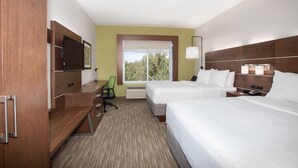 A hotel room with two beds, a desk, a chair, a TV, and a window with a view of trees. - Holiday Inn Express & Suites Sterling by IHG (Sterling)