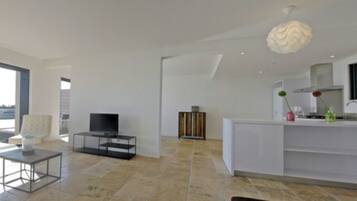 Panoramic Villa (Folaca) | Living area | Flat-screen TV