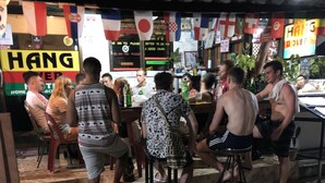 A restaurant with a grill area in the foreground. - Hangover Hostel (Ko Phi Phi)