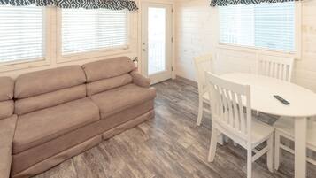 Cottage, 2 Bedrooms (Linens not provided) | Living room | Flat-screen TV