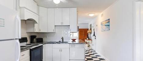 Condo, 2 Bedrooms | Private kitchen | Full-size fridge, microwave, oven, stovetop