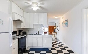 Condo, 2 Bedrooms | Private kitchen | Full-sized fridge, microwave, oven, stovetop